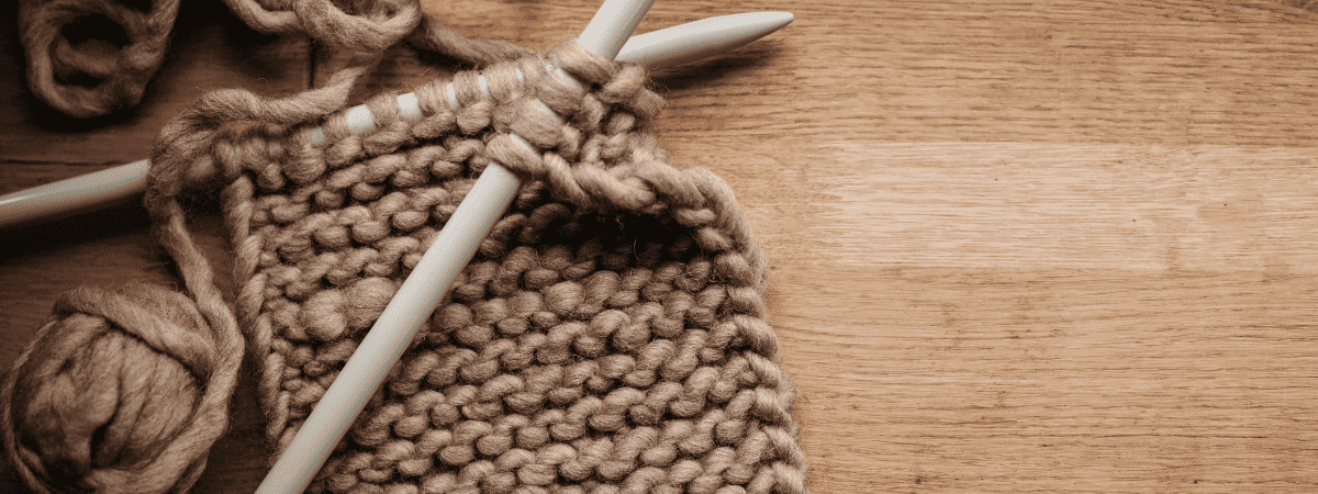 Grey knitting tools